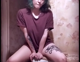 Teen girl loves to have fun on the washing machine