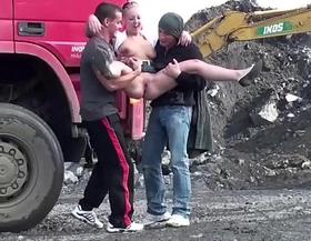 Cute blonde little girl fucked by 2 guys at a public construction site threesome